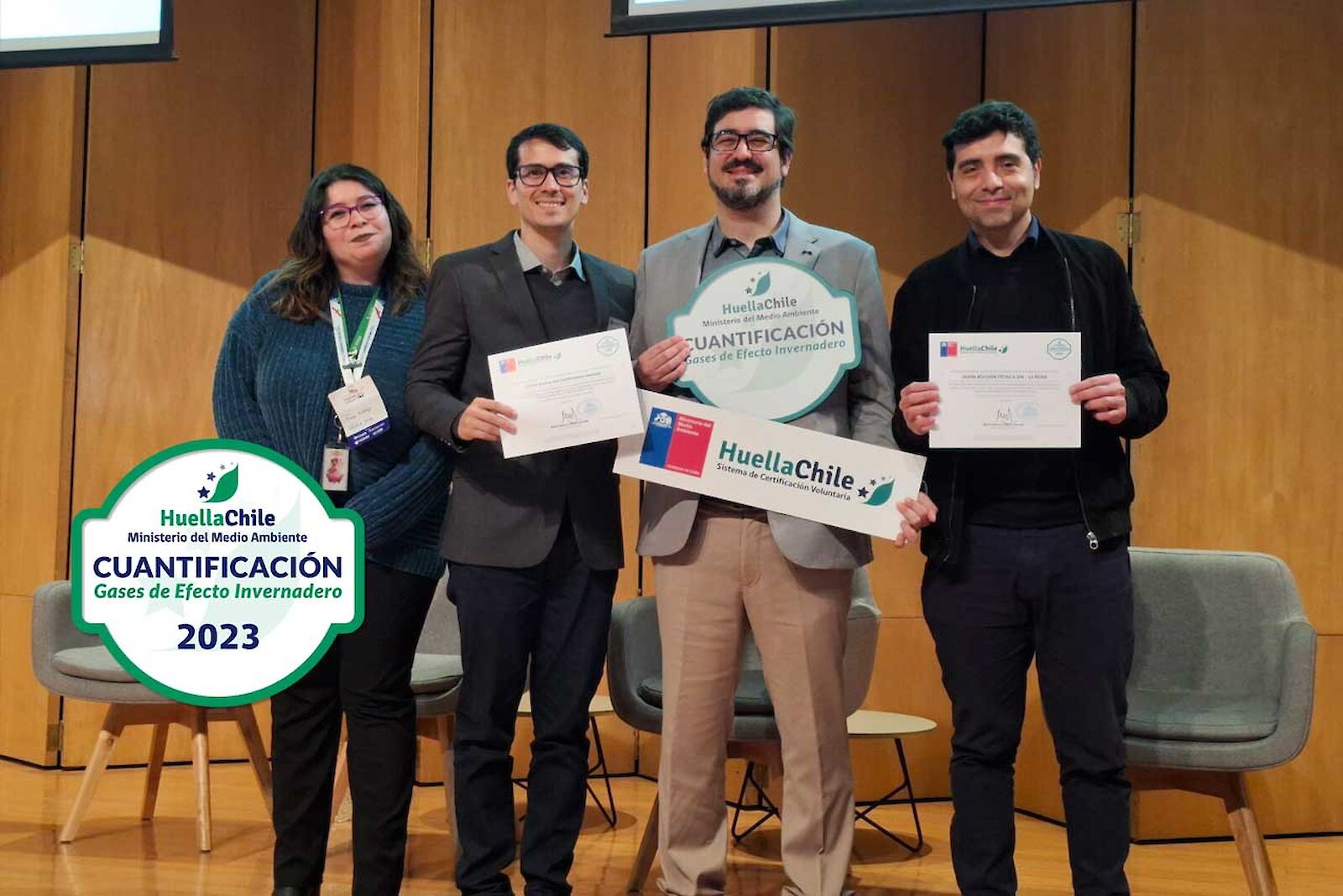 DEKRA employees from Chile show their certificates.